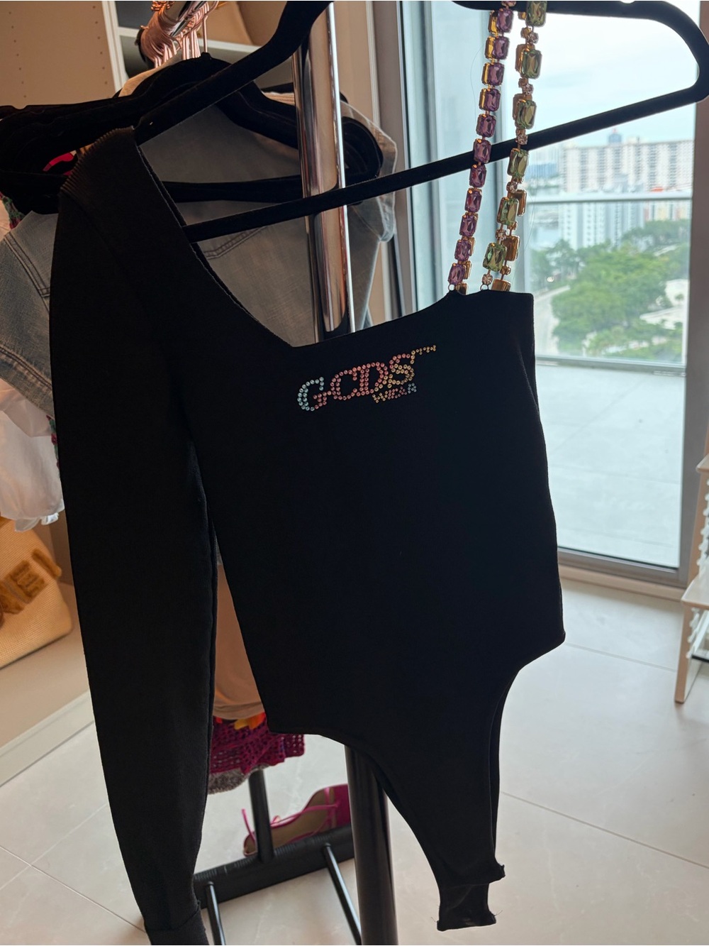 Black One-Shoulder Crystal Logo Bodysuit